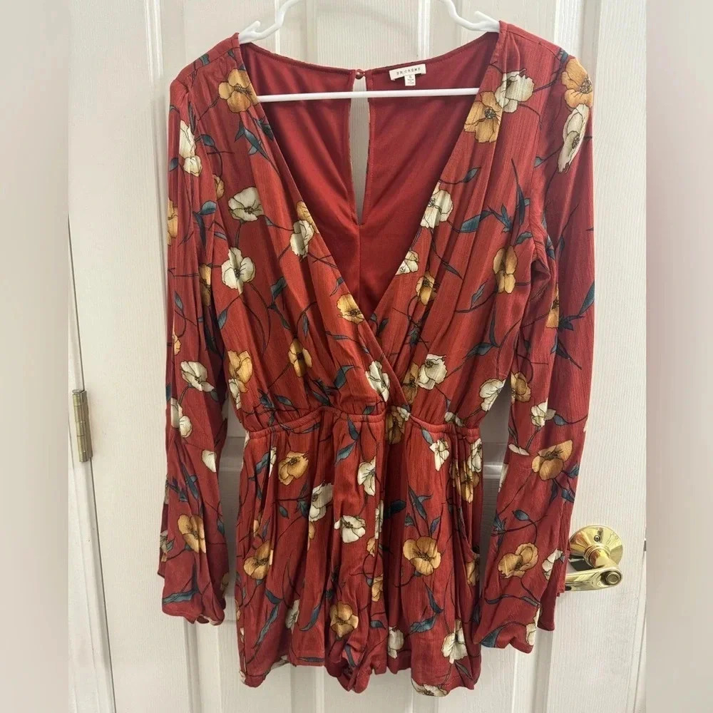 Fall floral long sleeve romper en crème size small